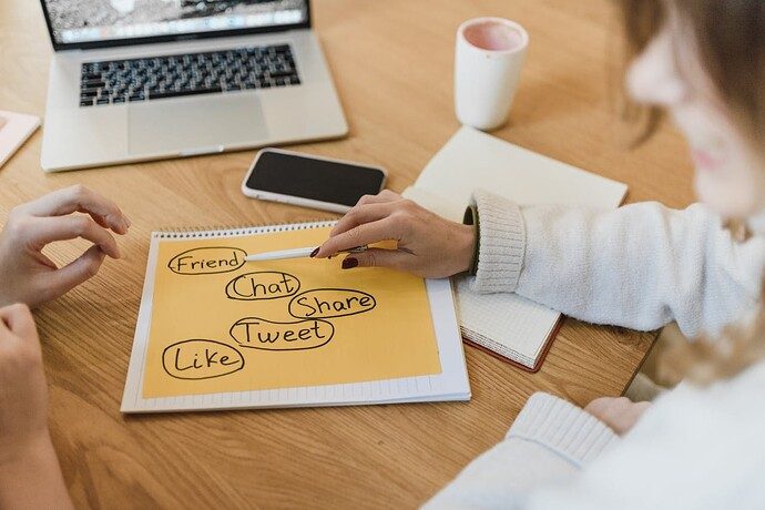 Credit: Pexels by Arina Krasnikova Free Two women planning social media marketing strategy with a laptop and smartphone.